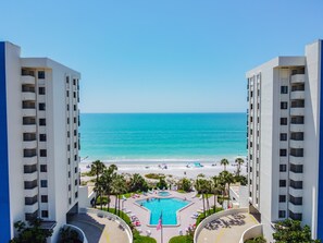 Heated beachfront pool and hot tub at the complex, just a few st - Heated beachfront pool and hot tub at the complex, just a few steps from this unit.