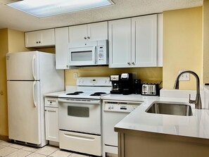 Full size Kitchen Appliances with Amenities for Cooking in your Home Away from Home