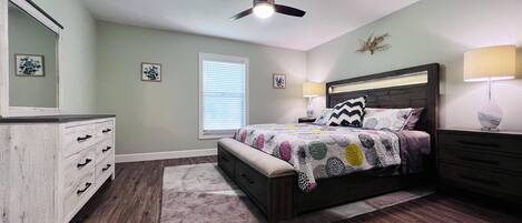 King size bed in a Farm House Master Bedroom