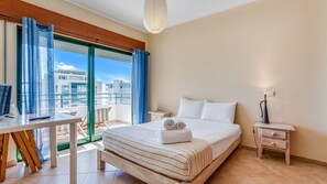 The bedroom has quality linen and access to a balcony with reclining chairs and sea view
#bedroom #tv #balcony #relax #algarve #portugal