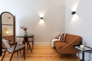 The plush, designer furnishings in this living area are carefully curated for both comfort and style, offering a perfect balance between relaxation and upscale living.