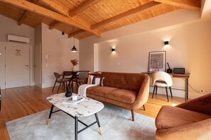 The plush, designer furnishings in this living area are carefully curated for both comfort and style, offering a perfect balance between relaxation and upscale living.
