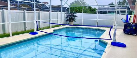 Large pool with volley ball and pool toys