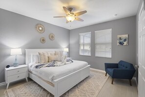Repose in luxury with our master bedroom's king-sized bed, where comfort and style live in harmony.