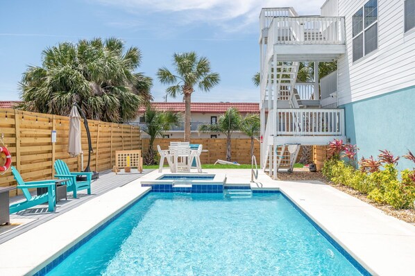 Welcome to your backyard oasis with a salt water pool, hot tub and more!