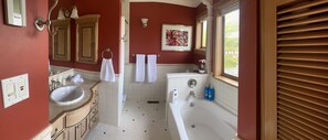 Master bathroom. With tub and separate shower.