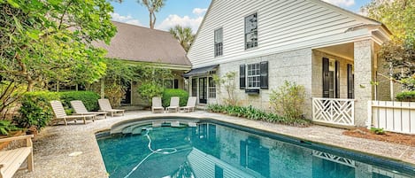 Private pool with lounge seating