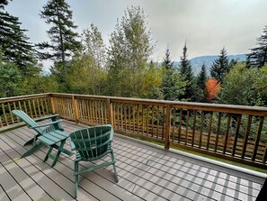 Spacious deck with slopes view
