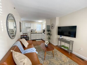 Living Room and Entrance, kitchen can be seen in background