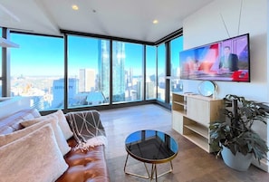 Lounge with skyline view aside smart TV