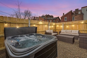 A large hot tub, that will allow you to cozy up and relax after a long day! There is plenty of comfortable seating for you and your friends to enjoy!