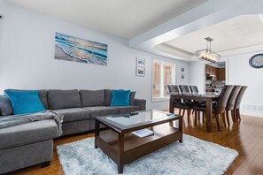 Living Room and Dining Area, includes a smart TV