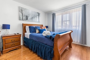 Master Bedroom with 1 queen bed, smart TV, large walk-in closet and 4-piece ensuite bathroom