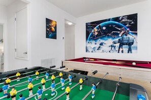 Indoors, you'll find plenty of entertainment, including a foosball table and pool table!