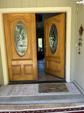 French doors open up to complete private experience surrounding this home