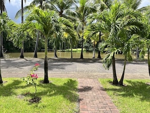 Enjoy a morning coffee on the front porch overlooking the tropical lagoon!