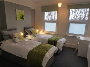The main bedroom can be arranged with one king sized bed or two single beds. 