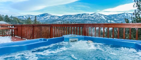 Enjoy the hot tub while taking in the panoramic views of Bear Mountain!