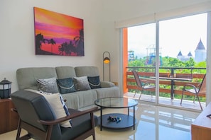 Living Room with Smart TV & Balcony