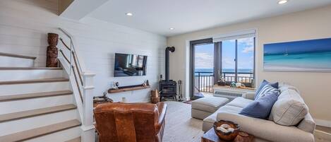 This duplex penthouse provides an upscale, relaxing beach house setting.
