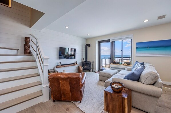 This duplex penthouse provides an upscale, relaxing beach house setting.