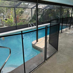 Pool view showing pool fencing for guest safety. 