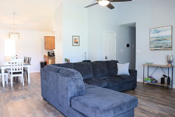 Large living room with space for the family to sprawl out and watch a movie.  