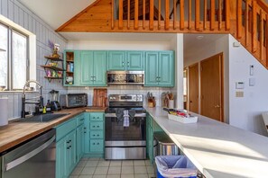 Updated fully stocked kitchen. 