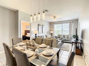 Enjoy meals with a view in this cozy, stylish dining area. Perfect for family dinners or entertaining guests!