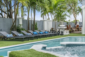 Unwind in style at our mansion oasis featuring a heated pool