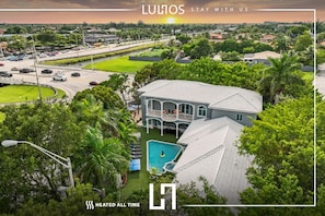 Experience the pinnacle of trendsetting design at our mansion's heated pool