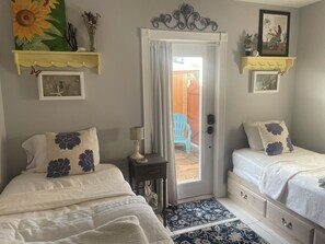 Entry Door Allows Full Light or Can be Darkened With Blackout Curtains