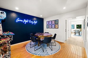 Dedicated game room, complete with poker table and arcade games!