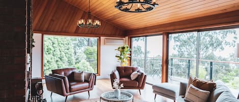 Upstairs living room with spectacular mountain views and wood fire place