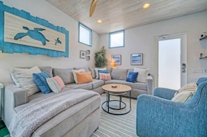 Stylish living area with beachy decor.