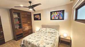 Bedroom 1 has a comfortable queen bed with a pullout twin bed.  In addition, it has a smart tv, ceiling fan, and its own ac unit.