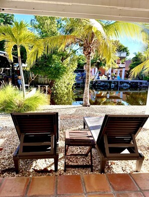 Lounge chairs with view of canal