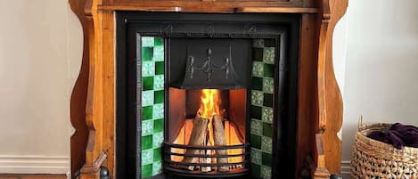 A freshly restored Victorian style fireplace in the lounge ready to warm up the winter days. (There are special lighting and operating instructions to follow left in the house.)