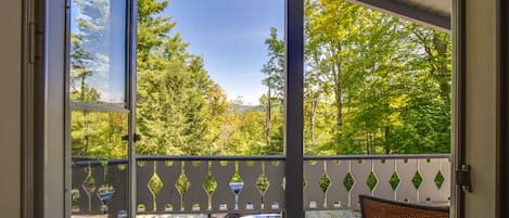 Beautiful tree-top mountain views from the large covered second floor deck.