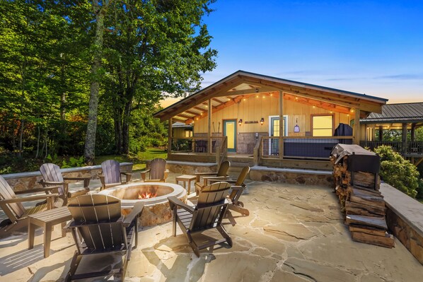 Unwind with long-range mountain views from the fire pit, patio, and hot tub deck