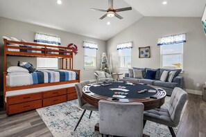 Prepare for some friendly competition with a poker table and a foosball table!