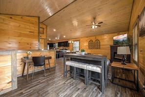 Living Room with a Study desk and a charging station.