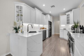 Remodeled fully stocked kitchen with new appliances