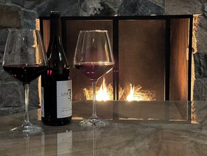Relaxing by the fireplace on a chilly winter evening