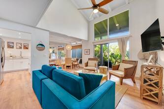 Condo w/ lush tropical surroundings, pool, golf nearby, WiFi, &W/D