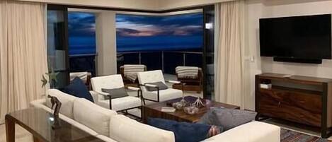 Diamante Ocean Club Residence OCR 305 Living Room with Ocean, Beach, and Sunset Views