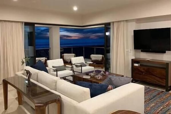Diamante Ocean Club Residence OCR 305 Living Room with Ocean, Beach, and Sunset Views
