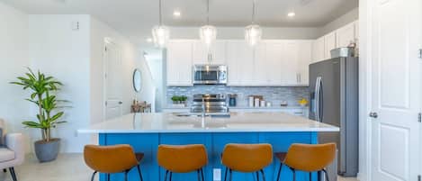 Bright Kitchen with Island seating for 4