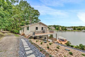 Inviting front lawn with panoramic lake views