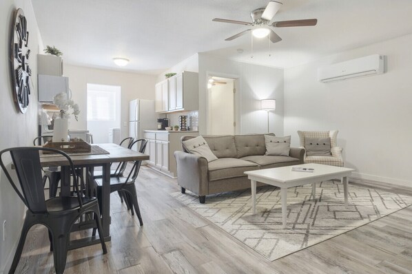 Very spacious living room and cozy sofa for your family :)